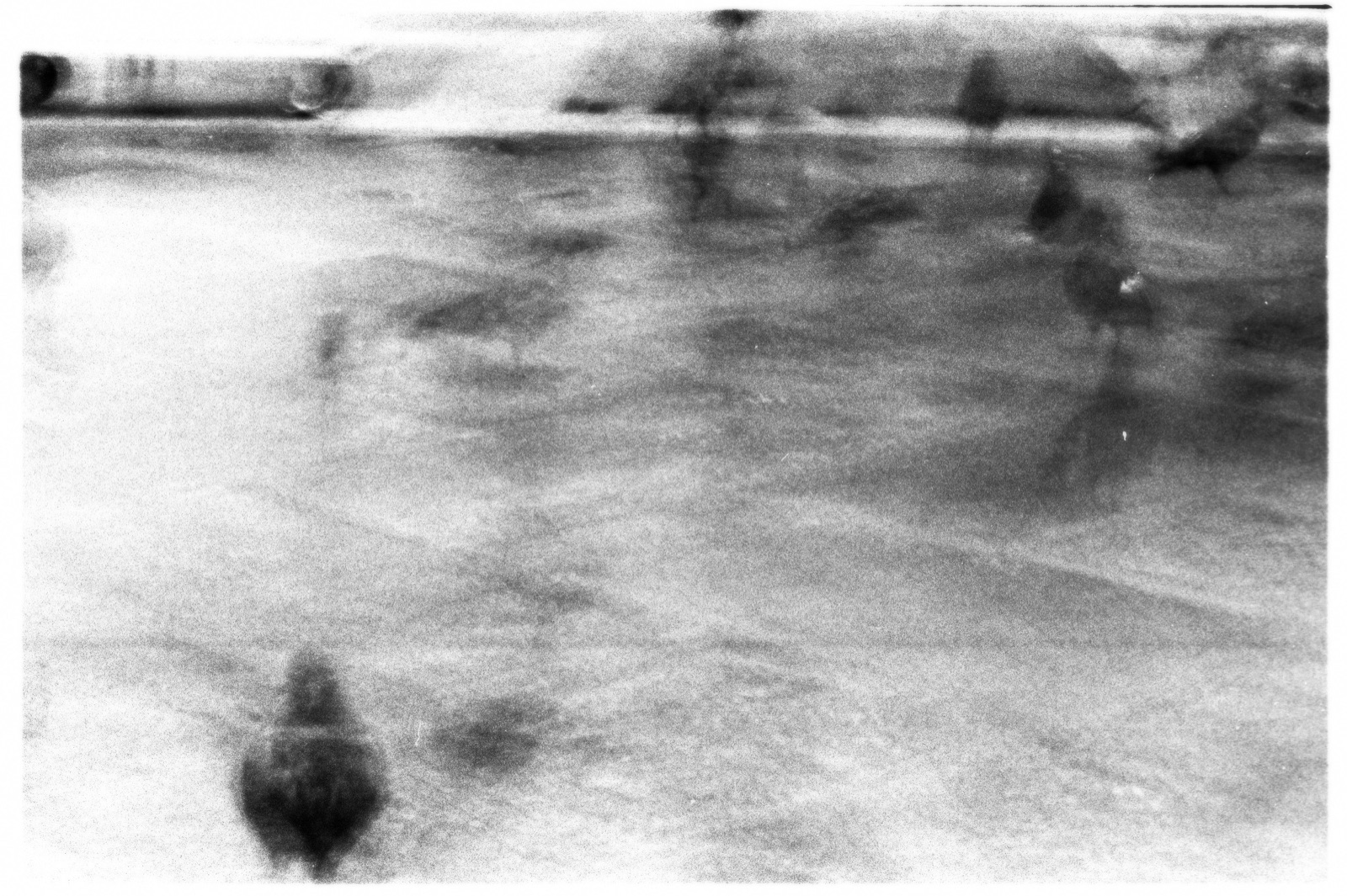 Grainy black-and-white abstract photograph